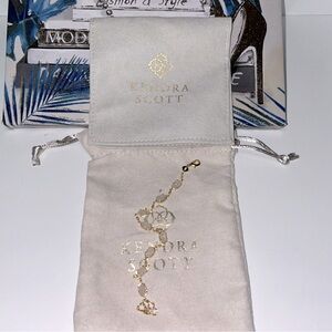 Gold bracelet with iridescent stone